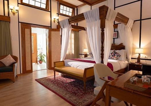 Kaziranga Heritage four-poster bedroom